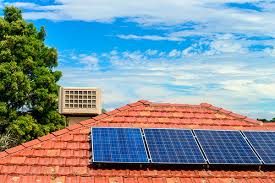Solar panels on orangle tile roof